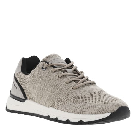 Sneakers beiges en maille avec des détails noirs et à lacets ronds