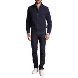 Blouson bleu marine uni à coupe ajustée avec un patch noir sur la manche