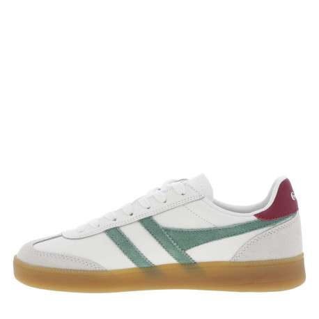 Tennis en cuir blanches à empiècements verts et à semelle plate miel translucide