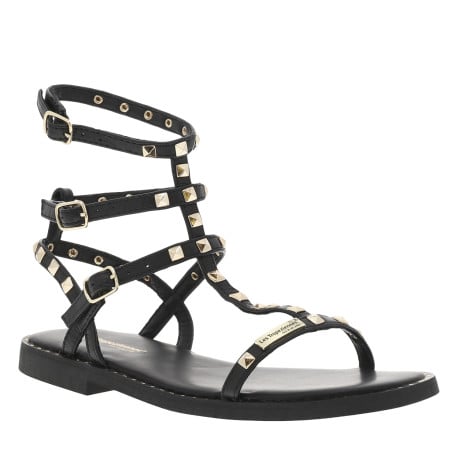 Sandales en cuir noires avec des clous dorés et à talon décroché bas