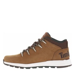 Bottines marrons avec le nom de la marque au talon et à lacets ronds