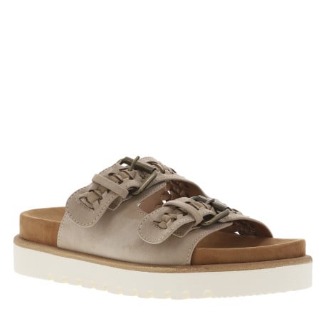 Mules taupe en suède à semelle plate et à sangles à boucle à ardillon