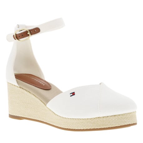 Sandales blanches avec le logo brodé à bout fermé et à talon compensé