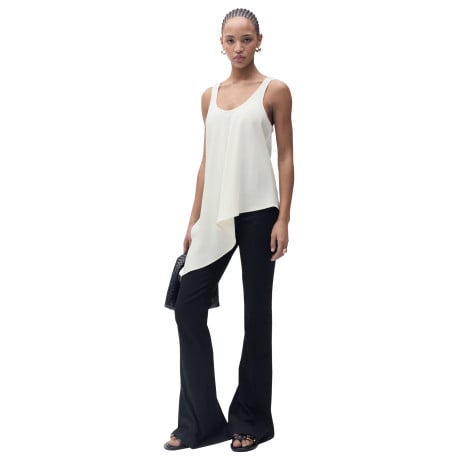 Top beige uni avec une coupe droite sans manches et un col rond  - Image 2