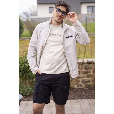 Veste blanche légère avec un aspect satiné un col montant et des poches - Image 4