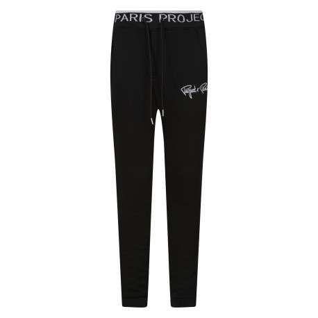Pantalon jogging noir uni avec une coupe slim et des cordons sur la taille