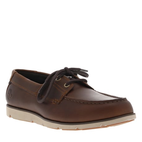 Mocassins en cuir marrons foncés avec le logo à lacets ronds et à semelle plate