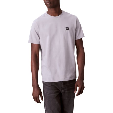 T-shirt en coton gris clair uni avec un petit patch brodé et à col rond