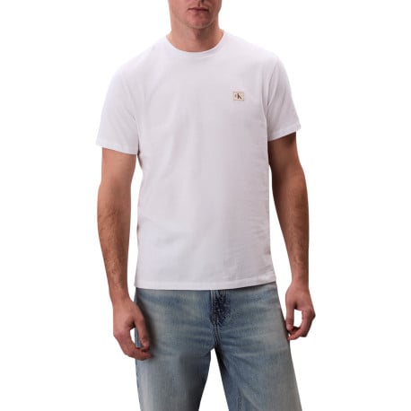 T-shirt en coton blanc uni avec un petit patch brodé et à col rond