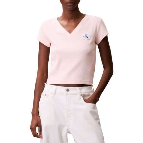 Top en coton rose uni à col v et à coupe courte avec un patch à la poitrine