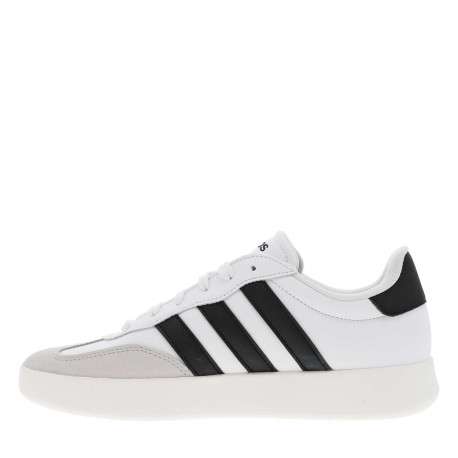 Tennis en cuir blanches avec semelle à talon plat et fermeture à lacets