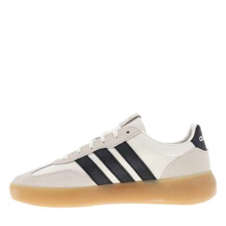 Baskets en cuir blanches avec semelle à talon plat et fermeture à lacets