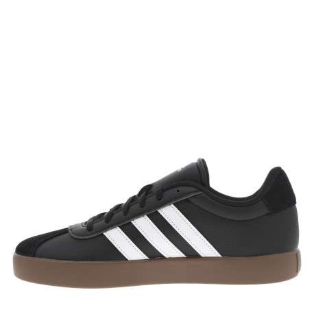 Tennis en cuir noires avec un talon plat et fermeture à lacets