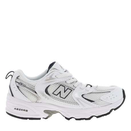 Baskets multisport 530 blanches avec multiples logos de la marques
