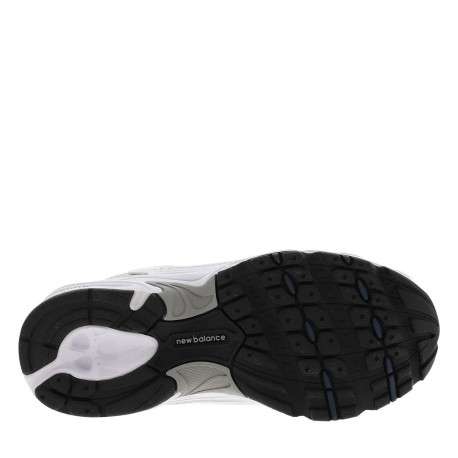 Baskets multisport 530 blanches avec multiples logos de la marques - Image 6