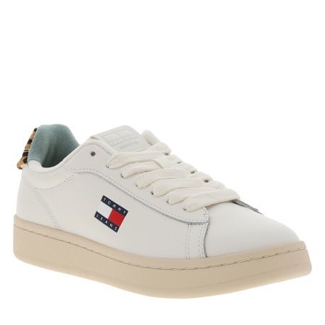 Tennis en cuir léopard siglées au nom de la marque avec semelle à talon plat