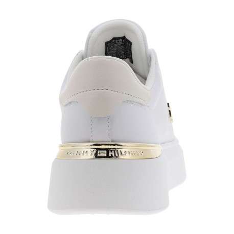 Tennis en cuir blanches avec semelle à talon plat et logos dorés - Image 6