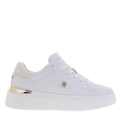 Tennis en cuir blanches avec semelle à talon plat et logos dorés - Image 2