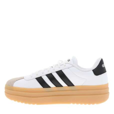 Tennis en cuir blanches avec semelle à talon plateau et lacets ronds