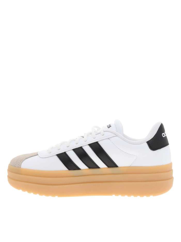 Tennis en cuir blanches...