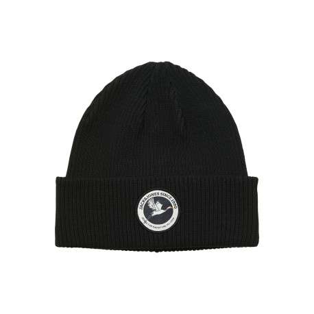 Bonnet en coton noir uni en maille avec un patch sur le revers