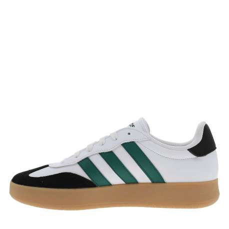 Tennis en cuir blanches avec semelle à talon plat et à lacets