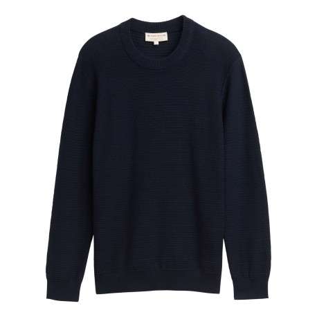 Pull en coton marine uni avec un col rond et des manches longues