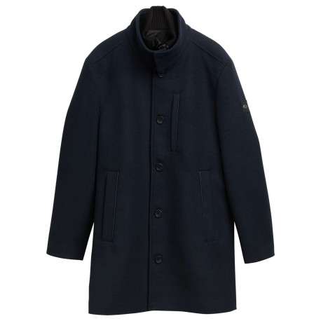 Manteau marine uni avec un col montant et boutonnière à l'avant