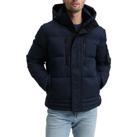 Doudoune matelassée marine avec un col à capuche et cordons de serrage