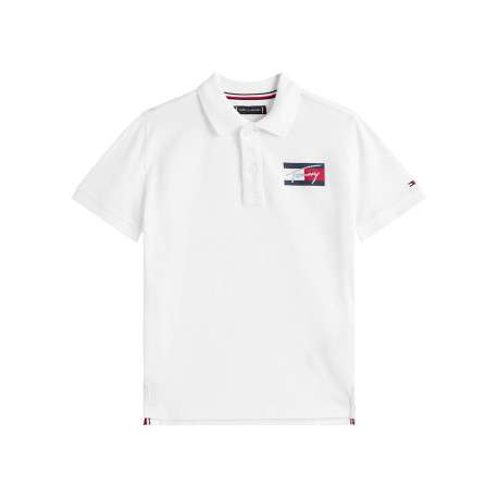 Polo coupe droite en coton blanc uni pourvu d'un col à rabats boutonné