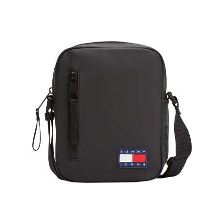 Sacoche noire unie avec un patch d'authenticité à l'avant et un zip