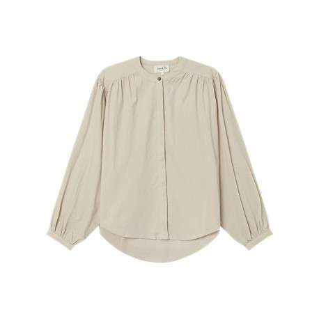 Chemisier en coton beige uni en velours avec une coupe ample et un col rond