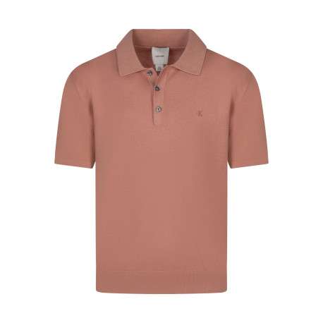 Polo rose uni en coton avec une coupe droite et un col à rabats