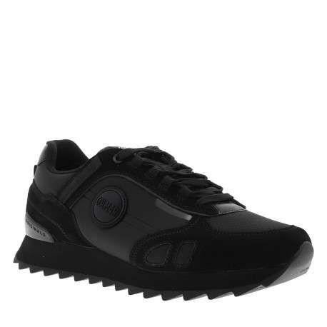 Baskets running Travis Sport Rash en cuir noires avec une semelle crantée
