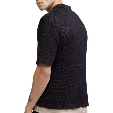Polo en coton noir uni en maille ajourée avec une coupe droite - Image 2