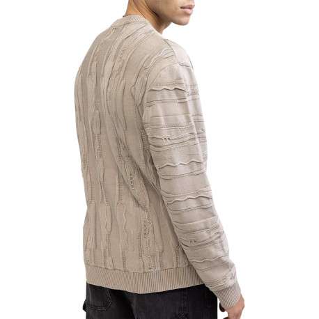 Pull en coton beige pourvu d'un col rond et de manches longues
