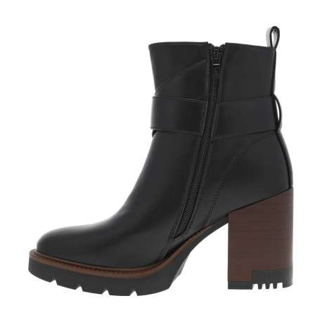 Boots noires à talon décroché haut avec un zip et une boucle décorative