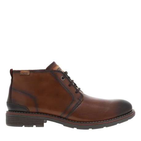 Bottines en cuir brunes à talon décroché bas avec des lacets ronds
