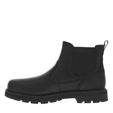 Boots en cuir noires avec un talon plat et des soufflets élastiqués