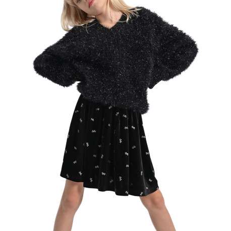 Jupe courte noire unie en velours avec une coupe plissée et nœuds brodés