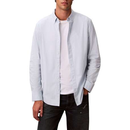Chemise en coton ciel unie avec une coupe droite et un col à rabats
