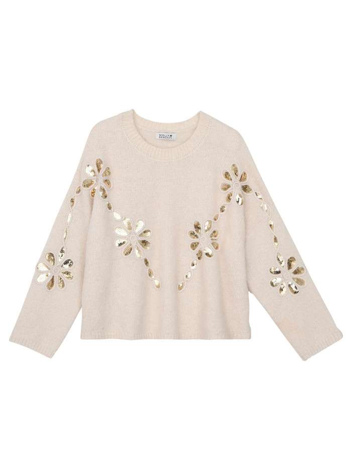 Pull écru avec des fleurs...