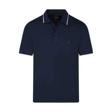 Polo en coton bleu uni avec une coupe droite et un col à revers