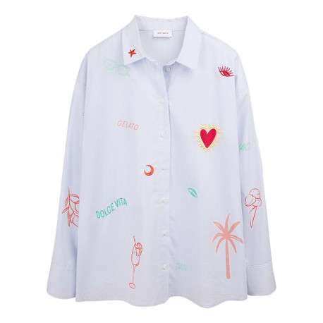 Chemisier bleu à motifs brodés avec une coupe droite et un col chemise