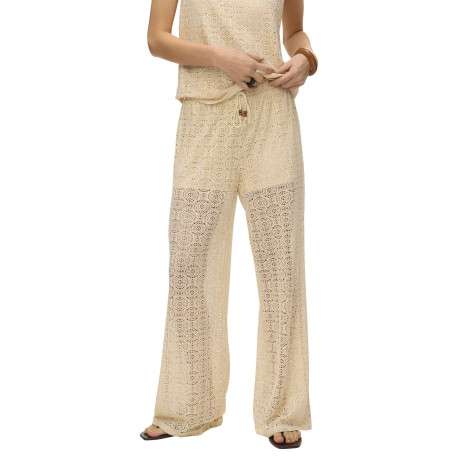 Pantalon beige en guipure coupe ample pourvu d'une taille élastiquée