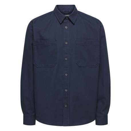 Chemise indigo unie en coton avec une coupe droite et un col à revers