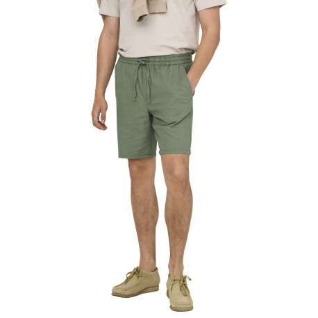 Short vert uni en coton et lin mélangé avec une coupe droite