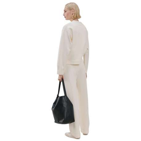 Pantalon chino beige uni avec une coupe droite et une taille élastiquée - Image 3