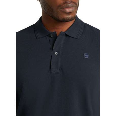 Polo en coton biologique marine uni avec une coupe droite et un col boutonné - Image 7