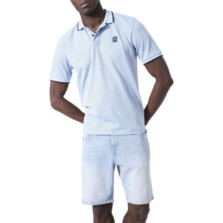 Polo en coton bleu ciel uni avec une coupe droite et un col à revers - Image 2